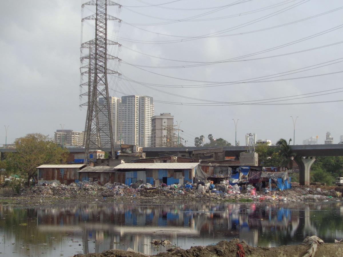 Scrap shops at the edge of the Mithi near Chunabhatti-BKC flyover