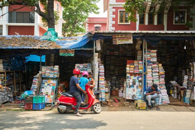 Second-hand Book Vendors Street in Trivandrum. Photo from Shutterstock. Reading the City: Book Recommendations for Seeing Indian Cities Differently