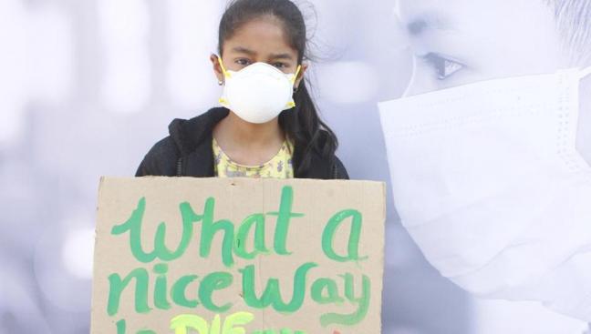 A child at the protest against growing air pollution in Gurugram, at Leisure Valley Park, Sector 29, in Gurugram, on Sunday, November 17, 2019. (Yogendra Kumar/HT PHOTO)